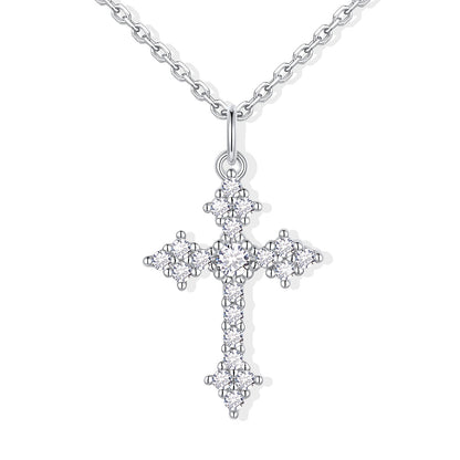 Silver cross pendant necklace on a white background