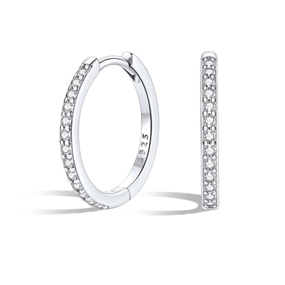 sterling Silver 14mm huggie earrings with embedded stones on a white background
